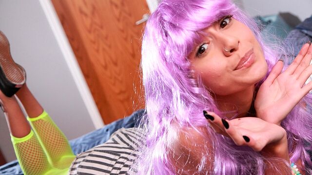 Purple wig steals the show in this Janice Griffith porn video