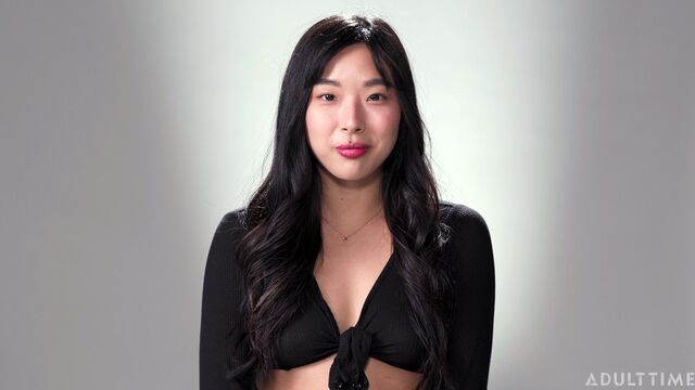 Asian with dark hairs Elle Lee plays with her accurate crack