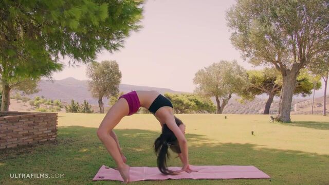 Cutie Elizabeth T is enjoying having solo fun on the grass