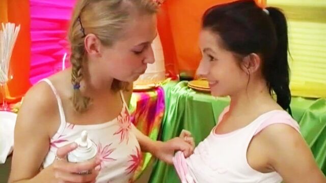 Two good babes Andrea and Stefani play with a nice dildo