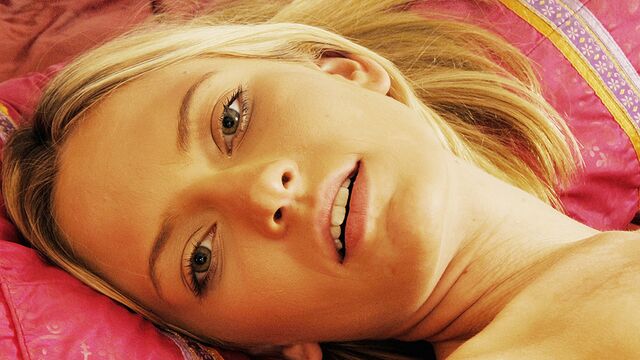 Michelle Honeywell shoves a transparent toy deep in her crack