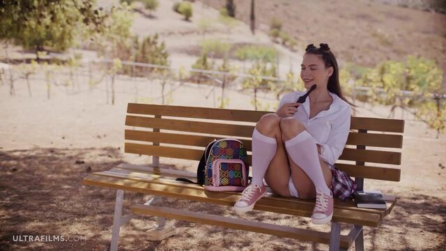 Cutie with natural tits Elizabeth T is touching herself outdoors