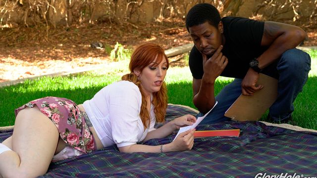 Good-looking redhead chick Lauren Phillips sucks a BBC