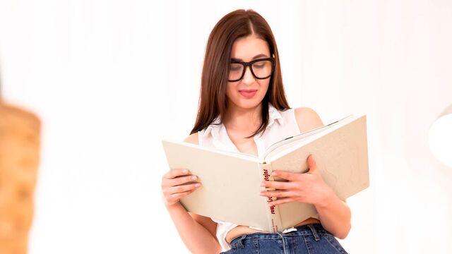 Stunning brunette April Storm gets her mouth fucked by a big boner