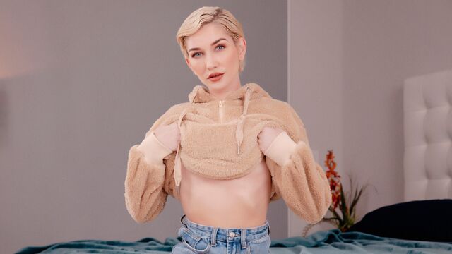 Glamorous blonde angel Skye Blue is having fun with a large dick