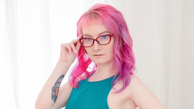 Stunning pink-haired chick Alien Fox gets her ass fucked from behind