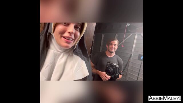 Spicy nun with shaved pussy Abbie Maley stimulates her clit