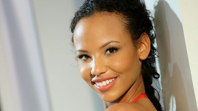 Stunning chick Romy Indy is having fun with a big wiener