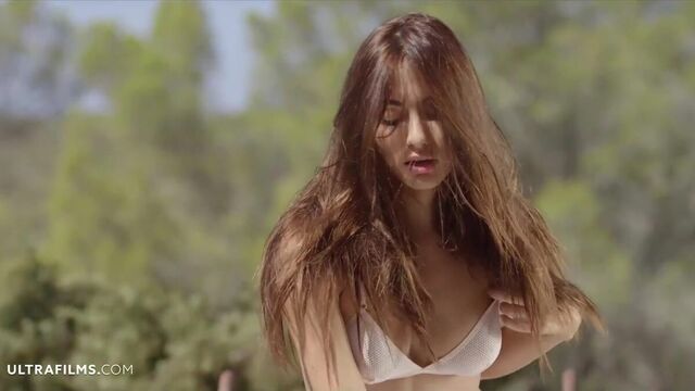 Stunning curvy angel Michaela Isizzu shows off her shaved pussy on cam