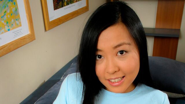 Yung is analysing herself in the doggy style pose with a dildo in her butt