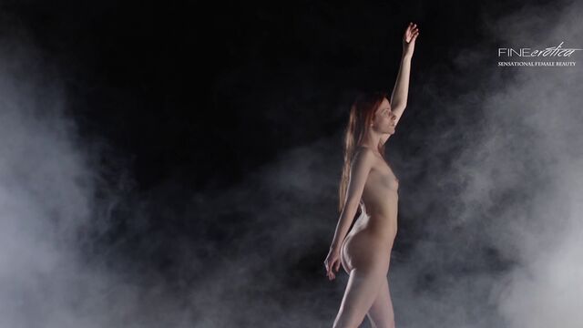 Beautiful soloing redhead Arijana shows off her godlike body