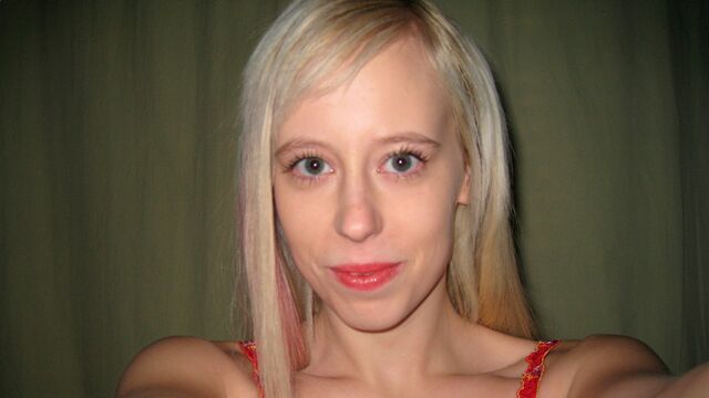 Adorable blonde with natural tits Teena grabs her big dildo