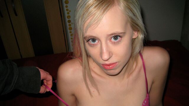 Stunning blonde model Teena is having fun with a massive dick