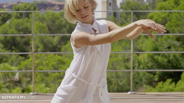 A very talented blonde with an innocent face Baby Dream dance on a rooftop