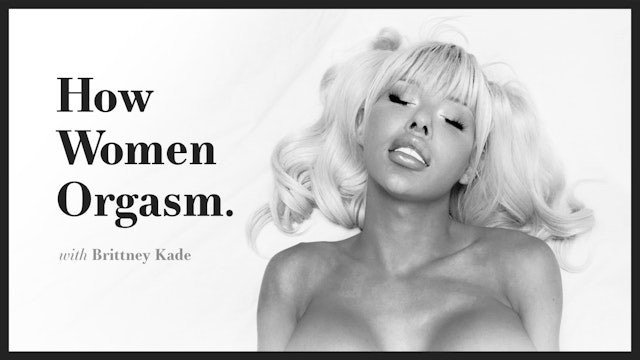 how women orgasm demo with nude blonde stroking prosthetic on white sheets