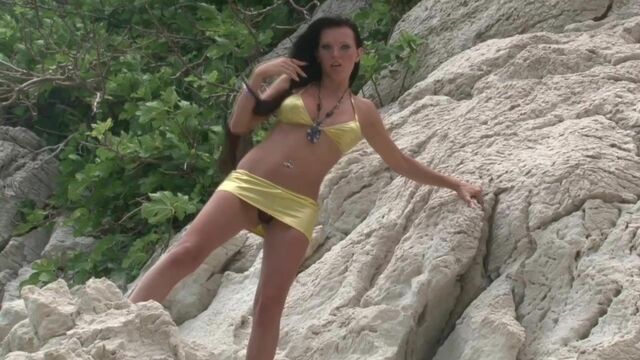 Elegant long-haired chick shows off her impressive naked shape