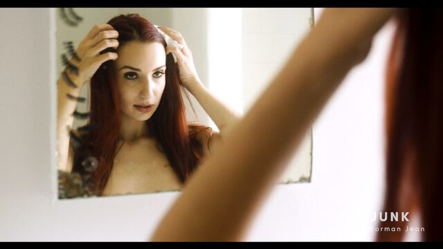 Flexible big-boobed chick April Snow shows her naked pussy